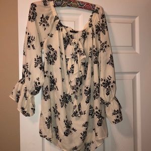 Can be worn off shoulders Cream and black blouse